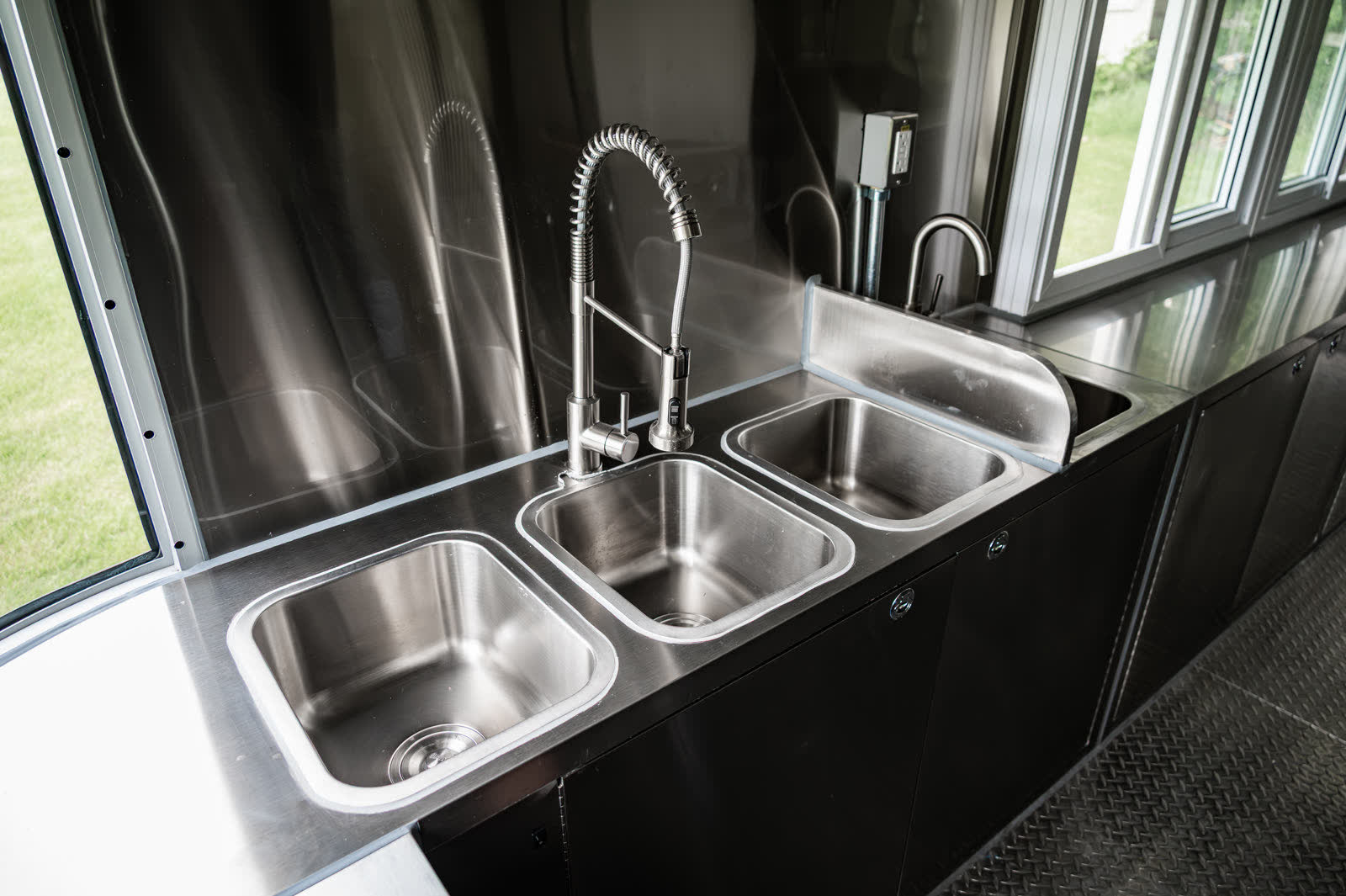Three-compartment sink and separate hand sink