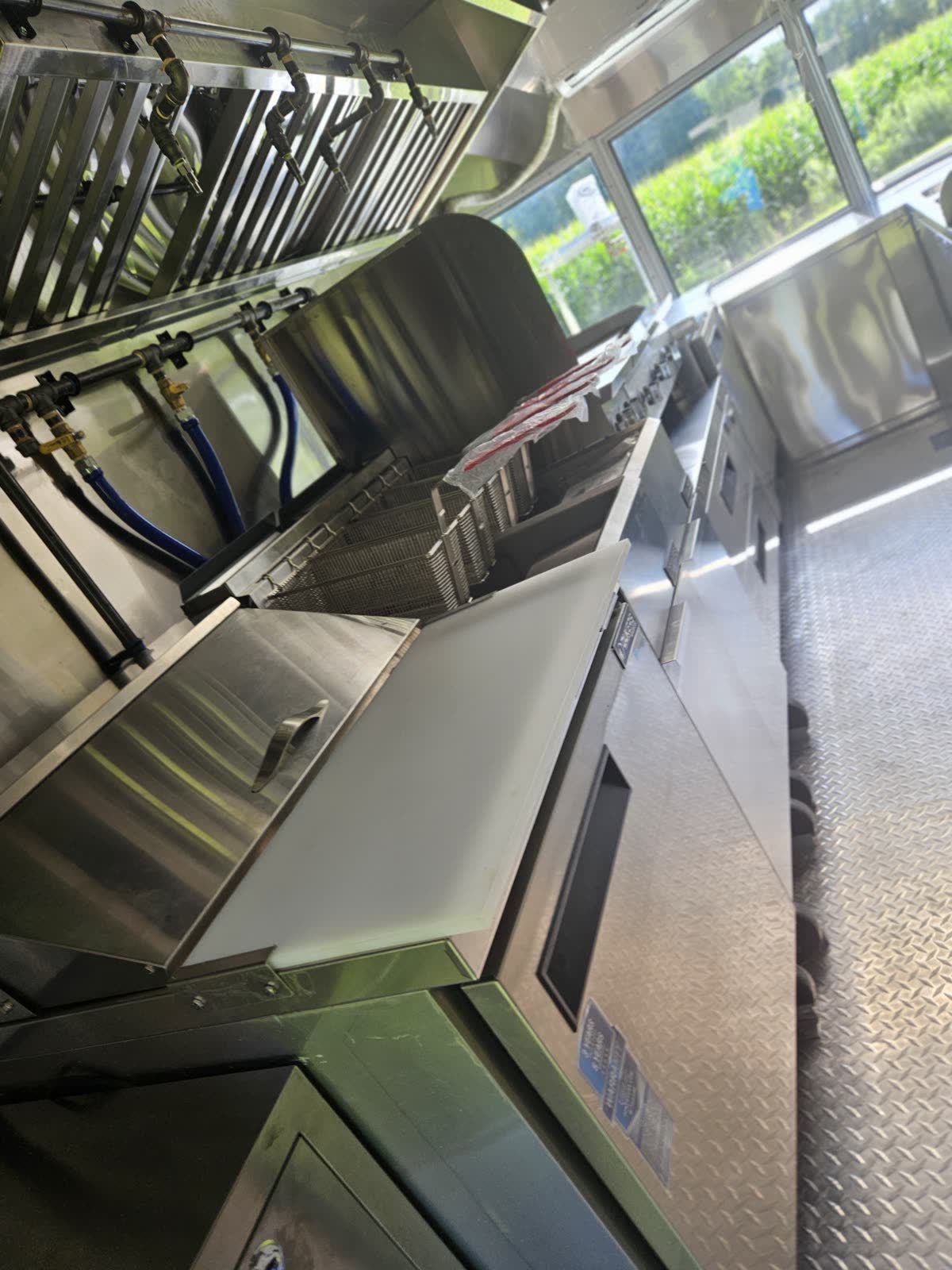 Cooking line with fryers and prep counter